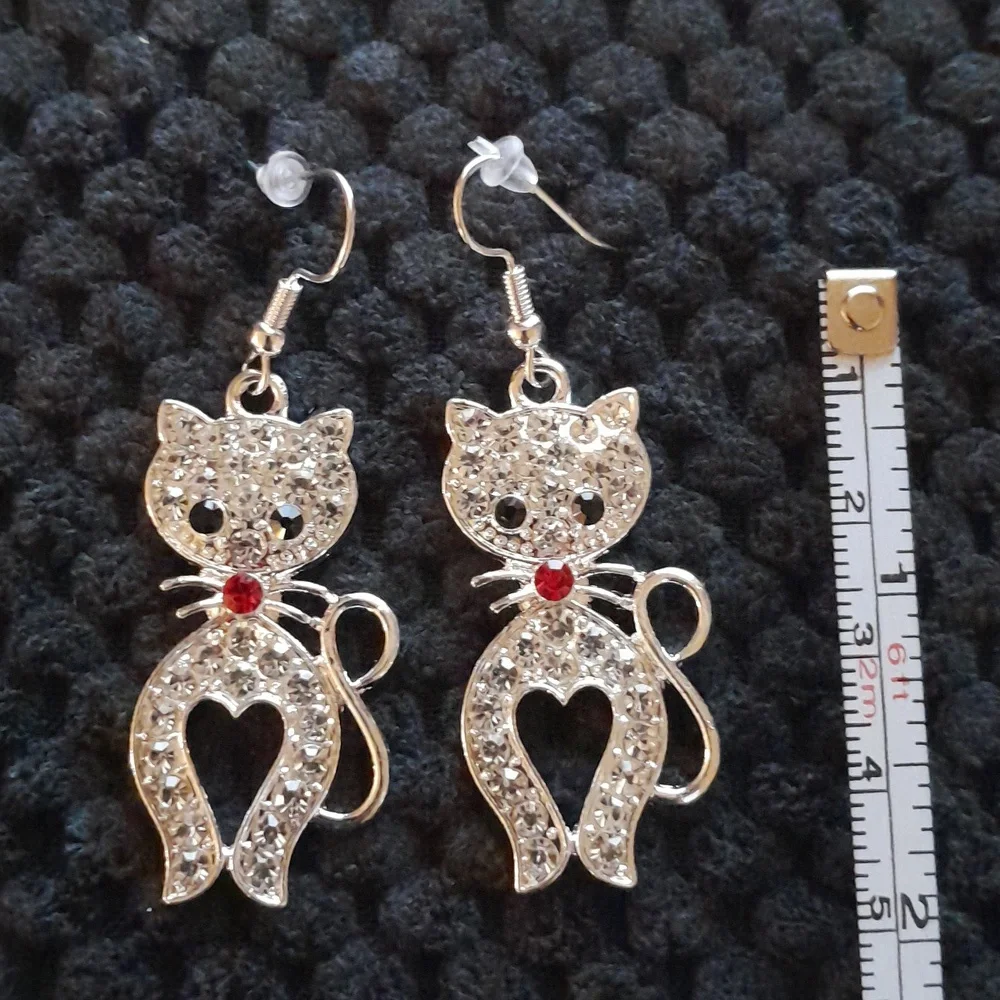 Isabella Elegant Silver Cat Earrings with Red Accents